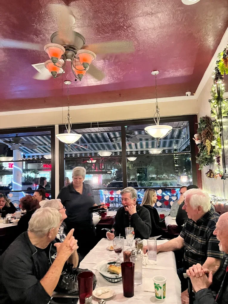 Guests and our staff in Papa Joe's dining room in Cape Coral