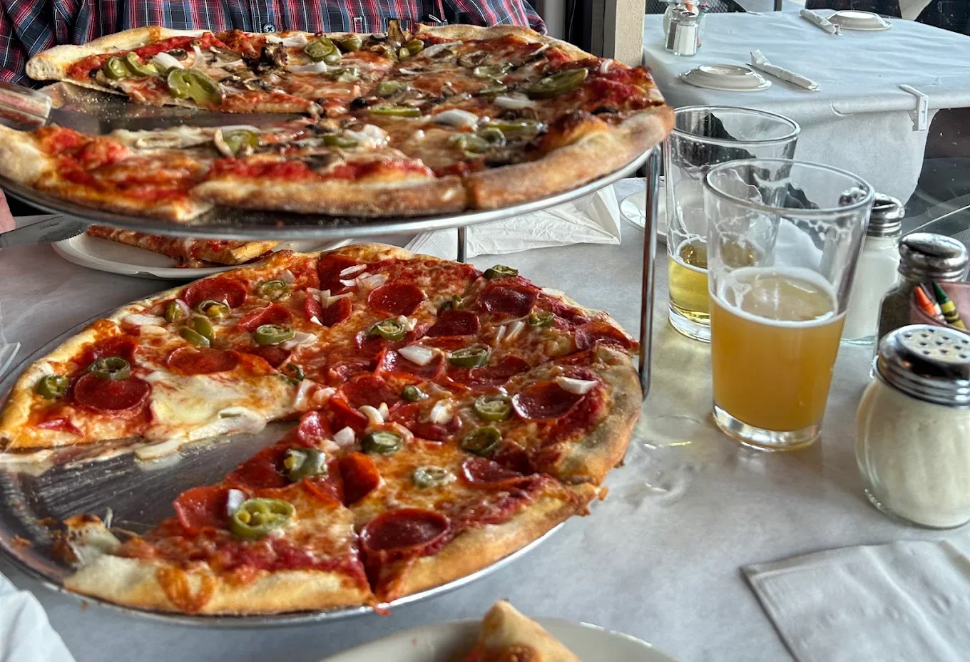 Two New York-style pizzas and draft beer at Papa Joe's in Cape Coral